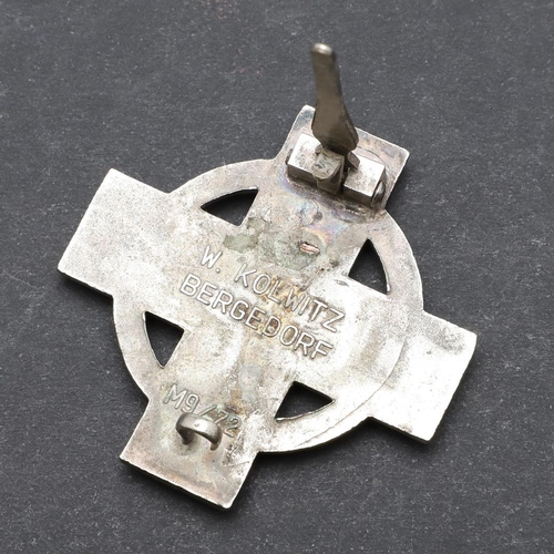 632 - A SECOND WORLD WAR GERMAN FIRE SERVICE CROSS, 1ST CLASS. A fire service cross in white metal with re... 