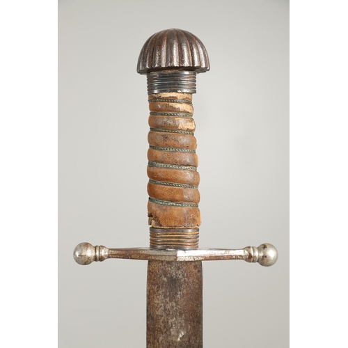 71 - A 19TH CENTURY SCOTTISH BROADSWORD. With a broad, pointed 71cm blade with double fullers, straight c... 