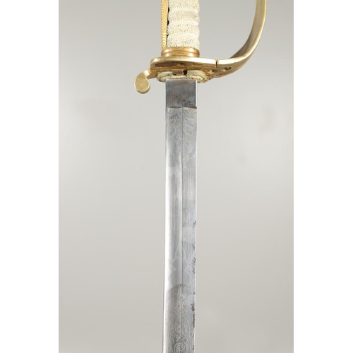 88 - A VICTORIAN ROYAL NAVAL RESERVE OFFICER's  SWORD AND SCABBARD. With an unusually long 81cm blade wit... 