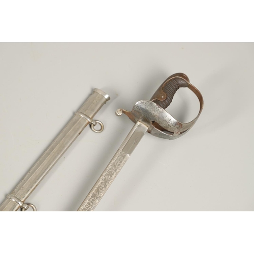 89 - A FIRST WORLD WAR 1889 PATTERN GERMAN SWORD AND SCABBARD. With a 78cm pipe-backed blade with spear p... 