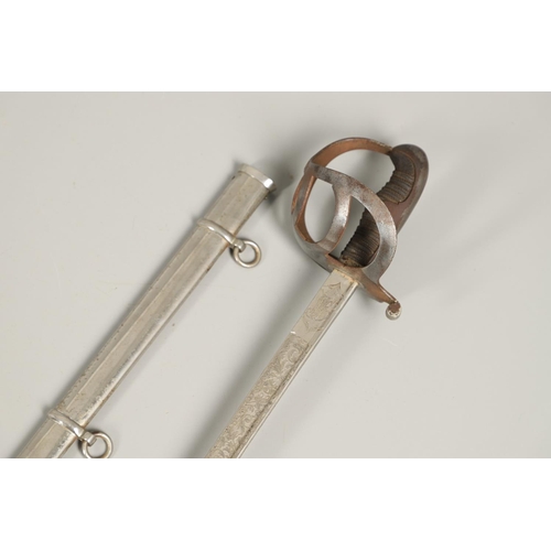 89 - A FIRST WORLD WAR 1889 PATTERN GERMAN SWORD AND SCABBARD. With a 78cm pipe-backed blade with spear p... 