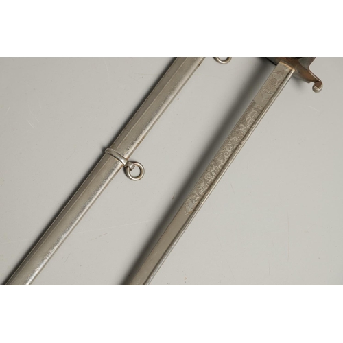 89 - A FIRST WORLD WAR 1889 PATTERN GERMAN SWORD AND SCABBARD. With a 78cm pipe-backed blade with spear p... 