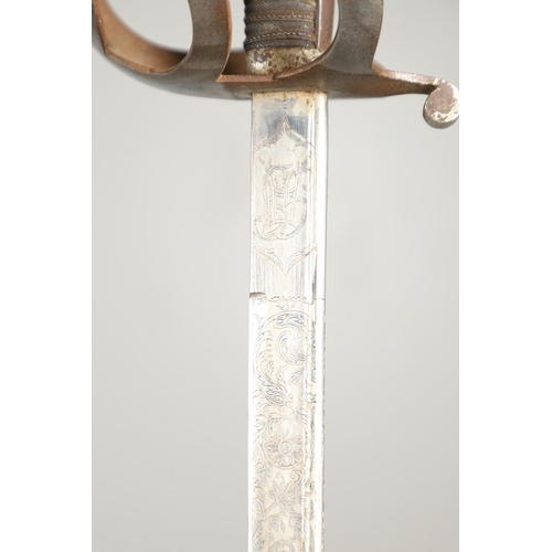 89 - A FIRST WORLD WAR 1889 PATTERN GERMAN SWORD AND SCABBARD. With a 78cm pipe-backed blade with spear p... 