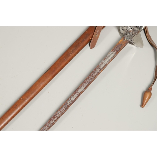 92 - A GEORGE V 1897 PATTERN SWORD AND SCABBARD. An 1897 Pattern Infantry Officers sword with an 83cm poi... 