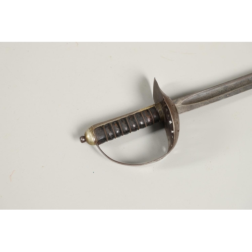 93 - A GEORGE V 1897 PATTERN INFANTRY OFFICERS SWORD. With an 82cm pointed single edged undecorated blade... 