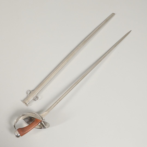 98 - A 1908 PATTERN CAVALRY TROOPERS SWORD AND SCABBARD. With a slender pointed single edged, fullered 90... 