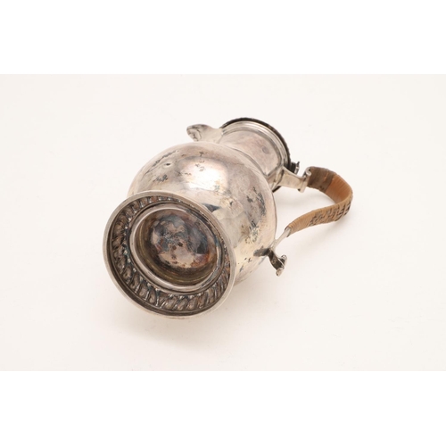 101 - A LATE VICTORIAN SILVER HOT WATER JUG. baluster form, with gadrooned borders, a cane-insulated handl... 