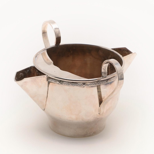 105 - A MODERN TWO-HANDLED, DOUBLE-LIPPED SILVER JUG. circular form, with a 