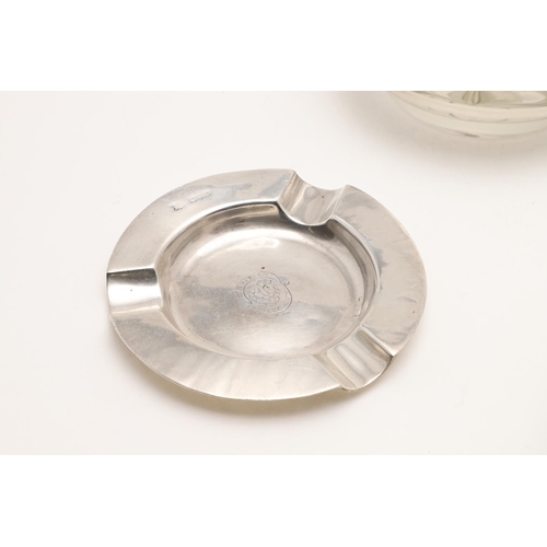 111 - SILVER ASHTRAYS:-. five silver ashtrays (one inscribed & one with an emblem) and a glass mounted ash... 