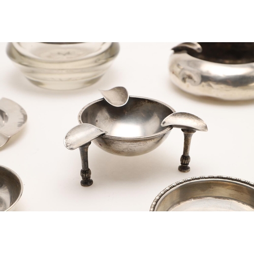 111 - SILVER ASHTRAYS:-. five silver ashtrays (one inscribed & one with an emblem) and a glass mounted ash... 