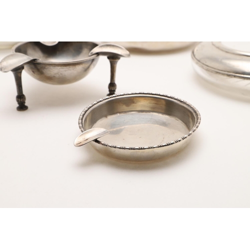 111 - SILVER ASHTRAYS:-. five silver ashtrays (one inscribed & one with an emblem) and a glass mounted ash... 