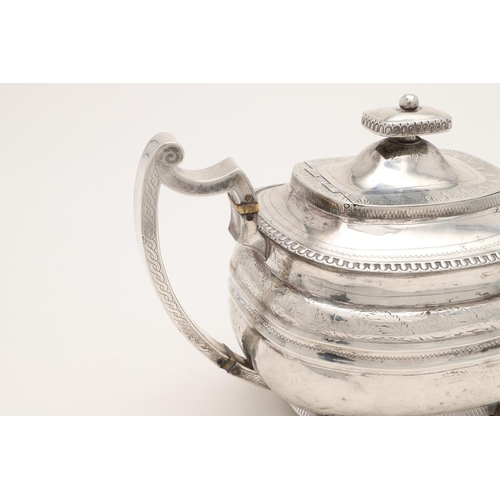 114 - A GEORGE III NORTH-COUNTRY PROVINCIAL SILVER TEA POT. of rounded oblong form, with an egg & dart bor... 