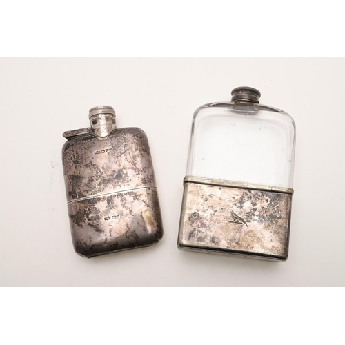 116 - A GEORGE V SILVER SPIRIT FLASK. rounded rectangular form, with a hinged twist-open cover and a pull-... 