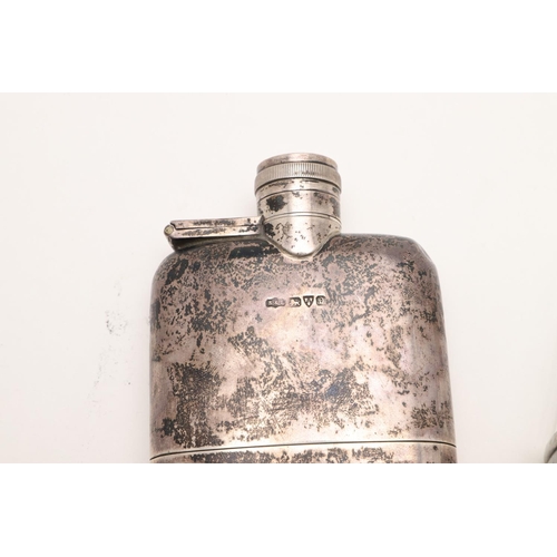 116 - A GEORGE V SILVER SPIRIT FLASK. rounded rectangular form, with a hinged twist-open cover and a pull-... 