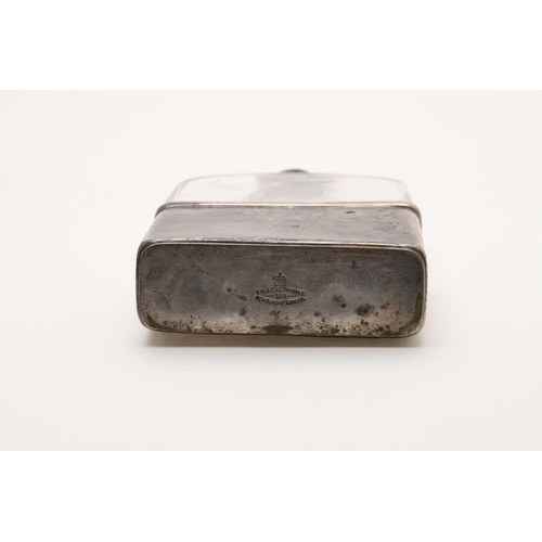 116 - A GEORGE V SILVER SPIRIT FLASK. rounded rectangular form, with a hinged twist-open cover and a pull-... 