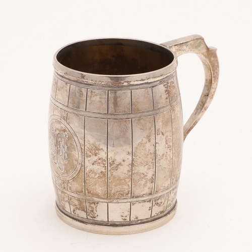 117 - A VICTORIAN SILVER BARREL MUG. with engraved hoops & staves, an angular scroll handle & initialled o... 