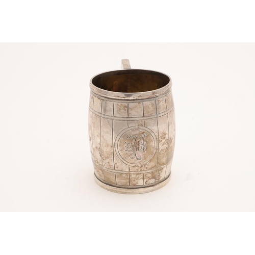 117 - A VICTORIAN SILVER BARREL MUG. with engraved hoops & staves, an angular scroll handle & initialled o... 