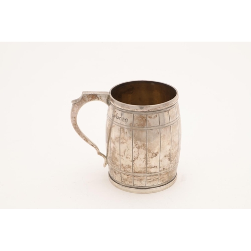 117 - A VICTORIAN SILVER BARREL MUG. with engraved hoops & staves, an angular scroll handle & initialled o... 