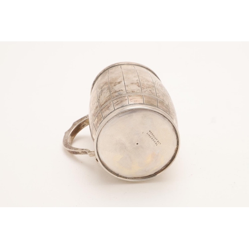 117 - A VICTORIAN SILVER BARREL MUG. with engraved hoops & staves, an angular scroll handle & initialled o... 