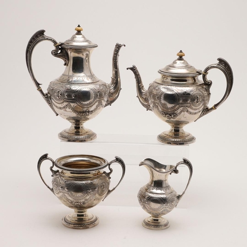 119 - A VICTORIAN FOUR-PIECE SILVER TEA & COFFEE SERVICE. of circular bellied form, with embossed, chased ... 