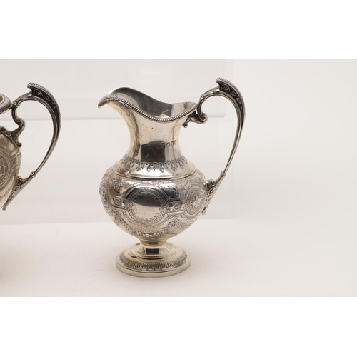 119 - A VICTORIAN FOUR-PIECE SILVER TEA & COFFEE SERVICE. of circular bellied form, with embossed, chased ... 