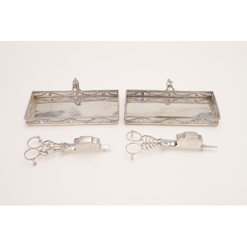 121 - A PAIR OF GEORGE III WOODEN MOUNTED SILVER SNUFFER TRAYS. rectangular form, with pierced sides, embo... 