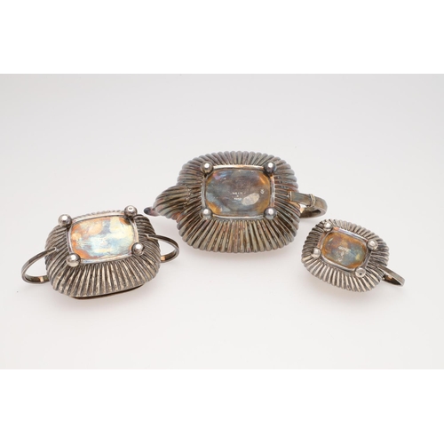 133 - A LATE VICTORIAN SMALL OR BACHELOR'S THREE-PIECE SILVER TEA SET. rounded rectangular, with tongue & ... 