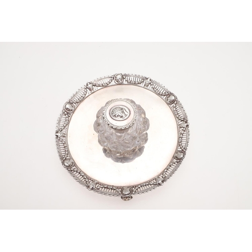 136 - A VICTORIAN SILVER INKSTAND. circular outline, the applied border with alternating masks intersperse... 