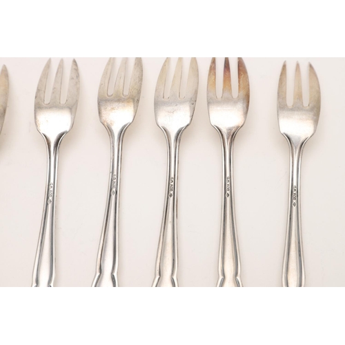 14 - MISCELLANEOUS SILVER FLATWARE. including a set of 7 loose German pastry/ cake forks, two tablespoons... 