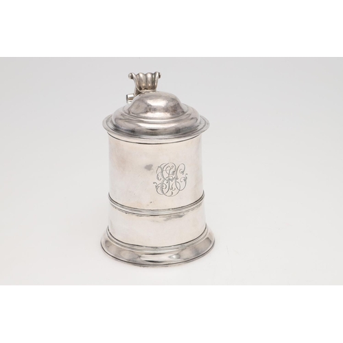 143 - A GEORGE II LADY'S SILVER TANKARD. tapering circular form, with an applied moulded girdle, a scroll ... 