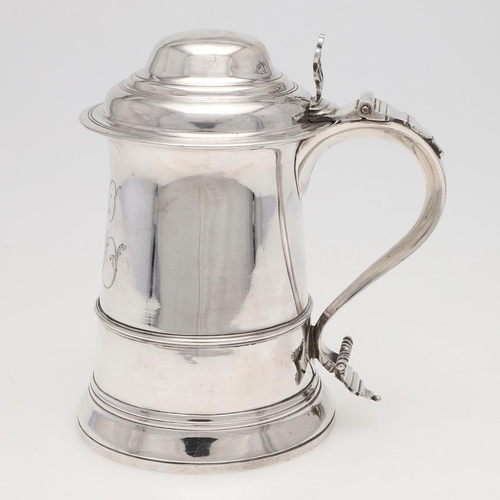 144 - A GEORGE III TAPERING SILVER TANKARD. circular, with an applied moulded girdle, an 'S'-scroll handle... 