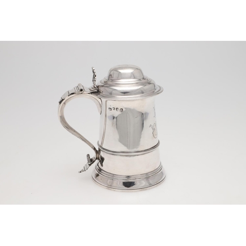 144 - A GEORGE III TAPERING SILVER TANKARD. circular, with an applied moulded girdle, an 'S'-scroll handle... 