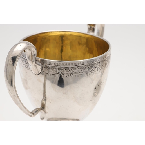 149 - A PAIR OF GEORGE III IRISH SILVER TWO-HANDLED CUPS. campana form, with twin scroll handles, an engra... 