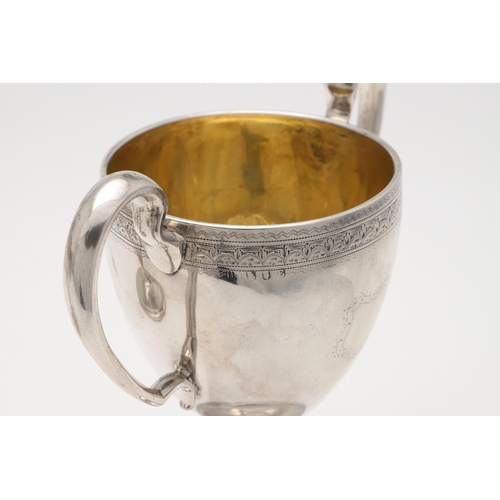 149 - A PAIR OF GEORGE III IRISH SILVER TWO-HANDLED CUPS. campana form, with twin scroll handles, an engra... 