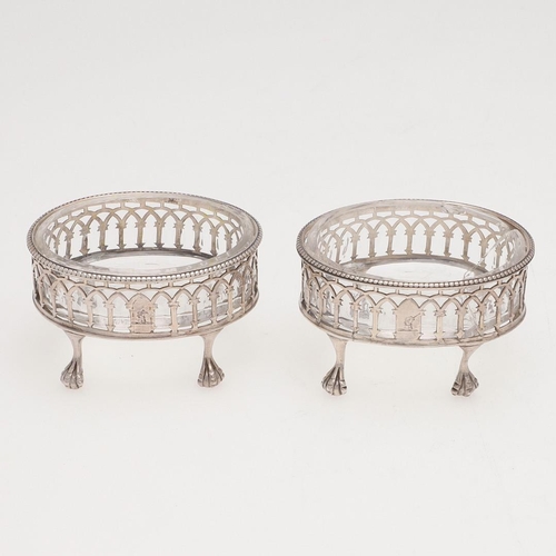 155 - A PAIR OF GEORGE III OVAL SILVER SALTS, BY HESTER BATEMAN. with bead borders, pierced sides and rais... 