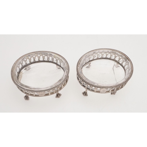 155 - A PAIR OF GEORGE III OVAL SILVER SALTS, BY HESTER BATEMAN. with bead borders, pierced sides and rais... 