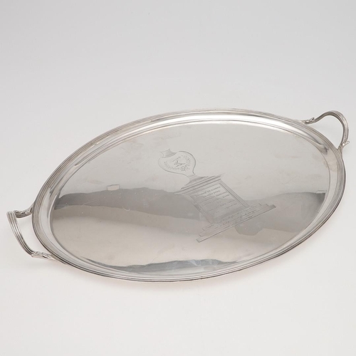 162 - A GEORGE III TWO-HANDLED SILVER TEA TRAY. oval, with reeded borders & handles, engraved in the centr... 