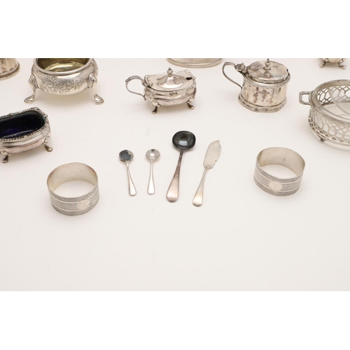 168 - A MIXED LOT OF SILVER. including 4 mustard pots (three with blue glass liners), 3 salt dishes, 3 pep... 