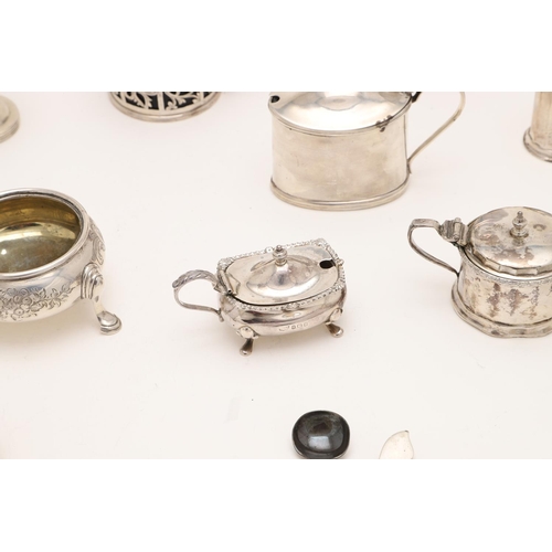 168 - A MIXED LOT OF SILVER. including 4 mustard pots (three with blue glass liners), 3 salt dishes, 3 pep... 