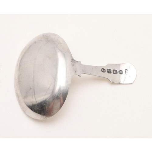 17 - TWO 19TH CENTURY SILVER CADDY SPOONS. a George IV example with a Fiddle stem and a large oval engrav... 