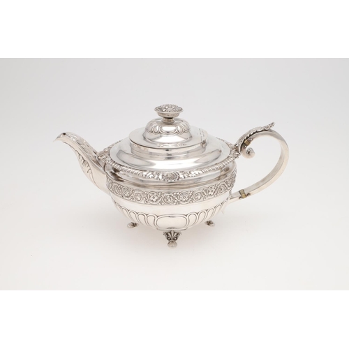 172 - A GEORGE III THREE-PIECE SILVER TEA SET. squat circular form, with gadroon & shell borders, wrythen ... 