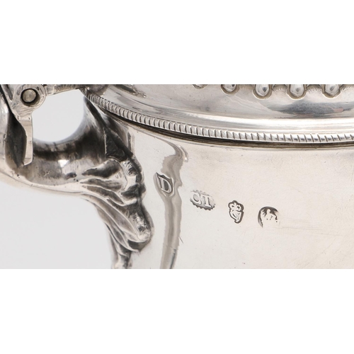 173 - A GEORGE III BALUSTER IRISH SILVER EWER OR JUG. with an acorn finial, a leaf-capped scroll handle an... 