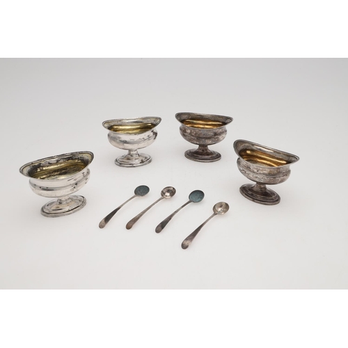 180 - A SET OF FOUR GEORGE III SILVER SALTS. on oval pedestal bases, with reeded borders and navette-shape... 