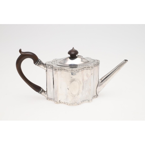 183 - A GEORGE III BRIGHT-CUT ENGRAVED SILVER TEA POT. shaped oval form, with a 'C'-scroll handle and a va... 