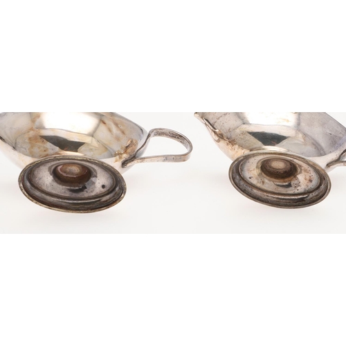 191 - A CASED PAIR OF SILVER SALTS & MATCHING SPOONS. in the form of sauce boats, initialled on one side 