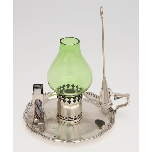 192 - AN EDWARDIAN SILVER CHAMBERSTICK. of shaped circular outline, with an attached match holder, a detac... 