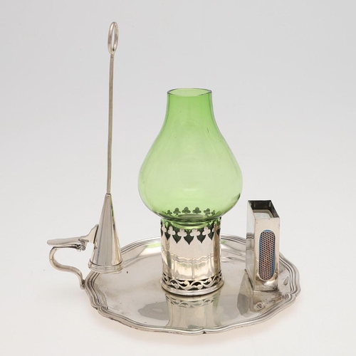 192 - AN EDWARDIAN SILVER CHAMBERSTICK. of shaped circular outline, with an attached match holder, a detac... 