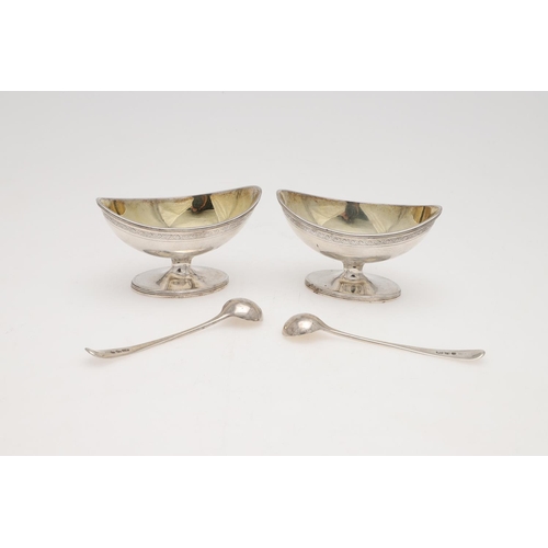 209 - A PAIR OF GEORGE III NAVETTE-SHAPED SILVER SALTS. with reeded borders and engraved friezes, gilt int... 