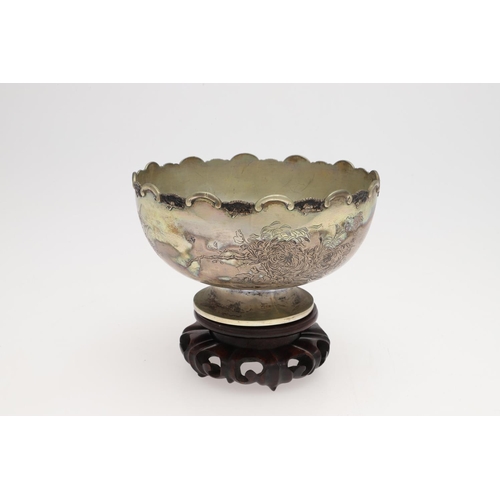 217 - A LATE 19TH/ EARLY 20TH CENTURY CHINESE SILVER ROSE BOWL. of circular outline, with a border of alte... 