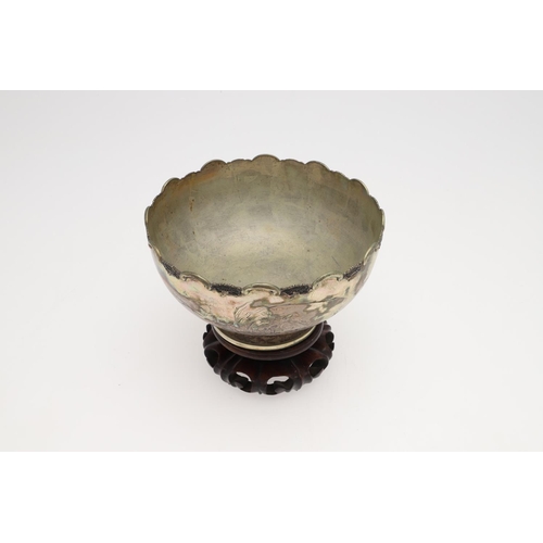 217 - A LATE 19TH/ EARLY 20TH CENTURY CHINESE SILVER ROSE BOWL. of circular outline, with a border of alte... 